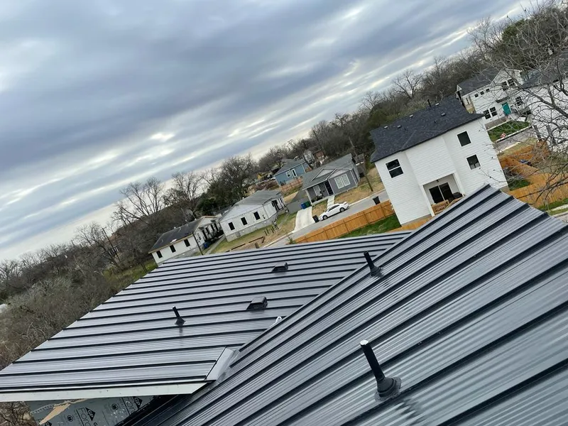 Standing seam metal roof panels with vents for Skylight Repair in North Fort Lewis